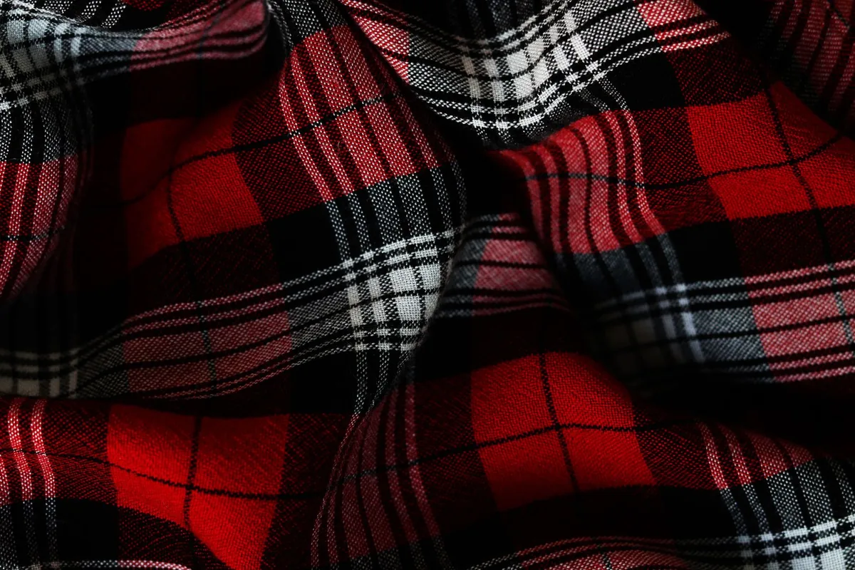 A close-up of red and black plaid fabric
